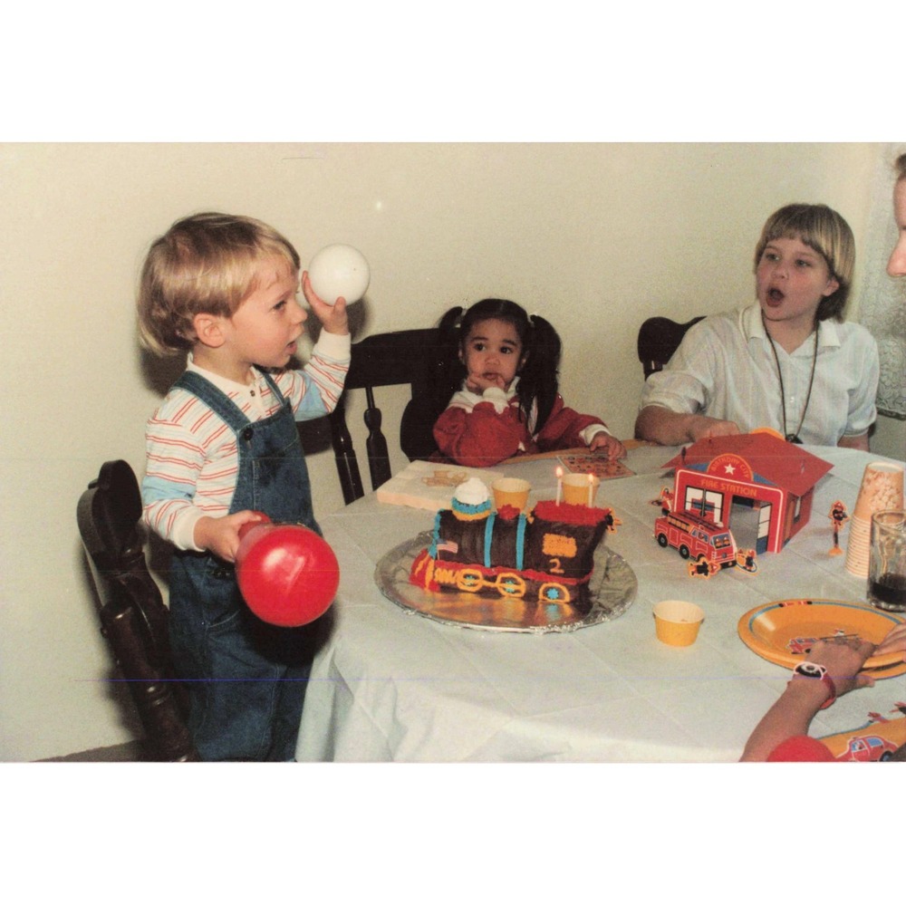 1987 Found Photo Stephen 2nd Birthday Train Cake Fire Station Toys 80s Snapshot - Picture 1 of 2
